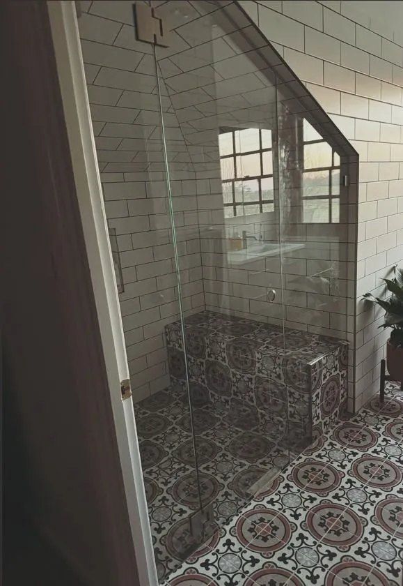 Walk-in shower with accessible fittings